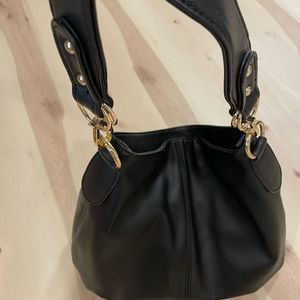 Sleek black purse for sale!
